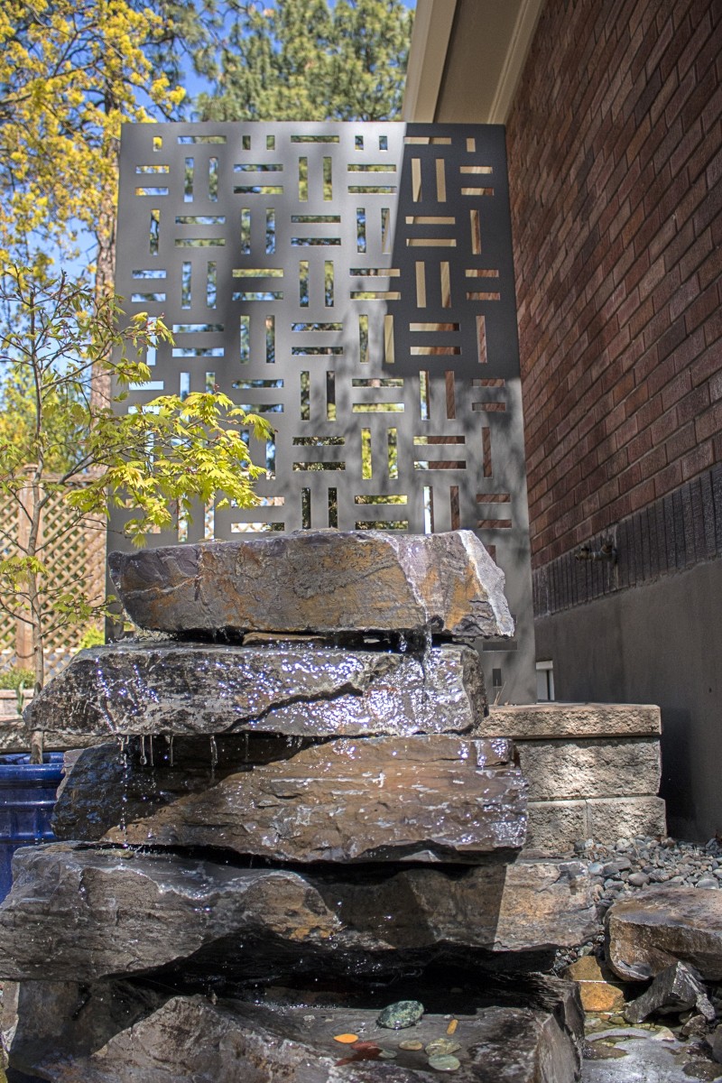 Revamp crosshatch decorative metal landscape privacy screen rock waterfall